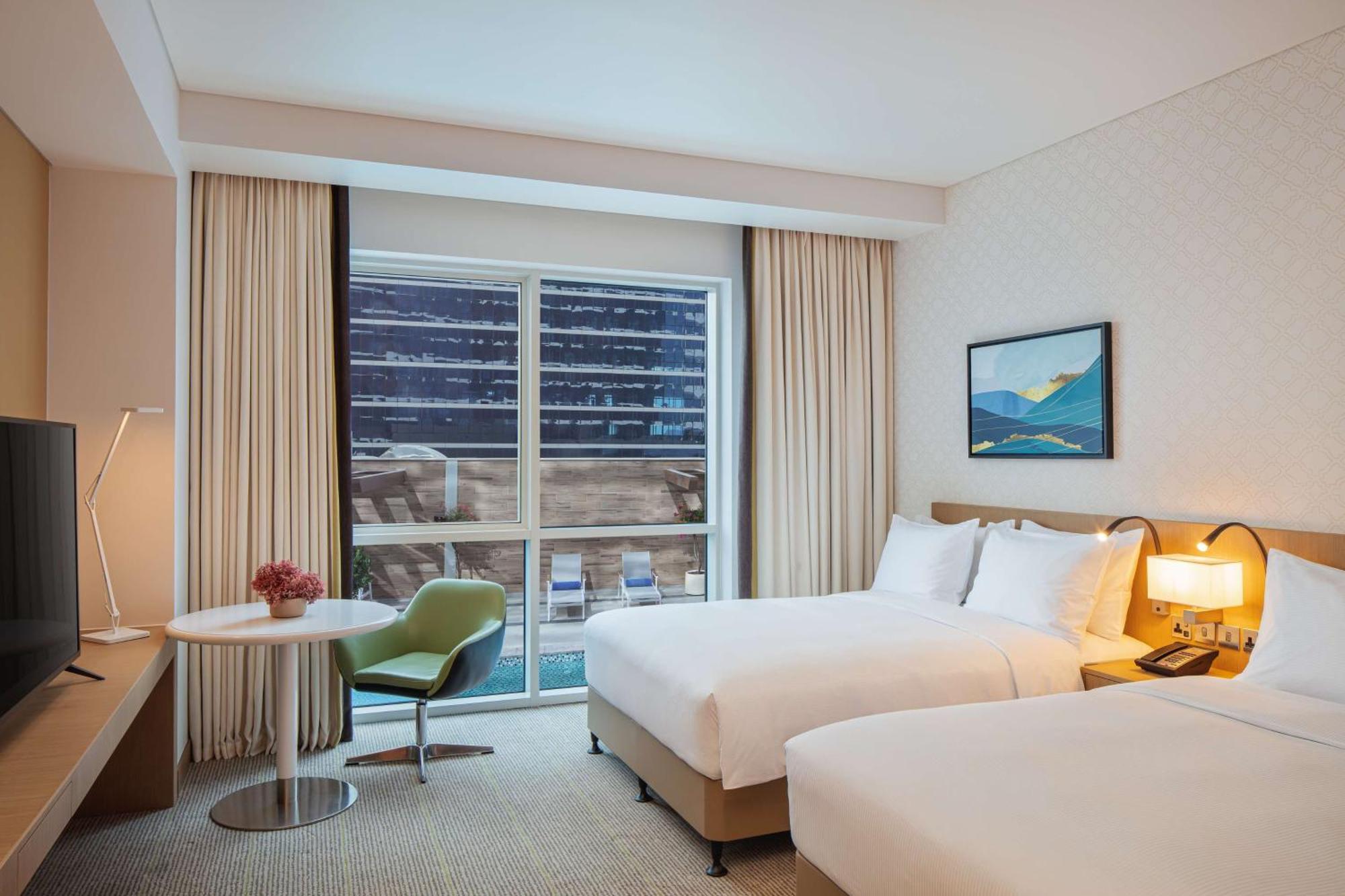 Doubletree By Hilton Fujairah City Ngoại thất bức ảnh A room at the hotel